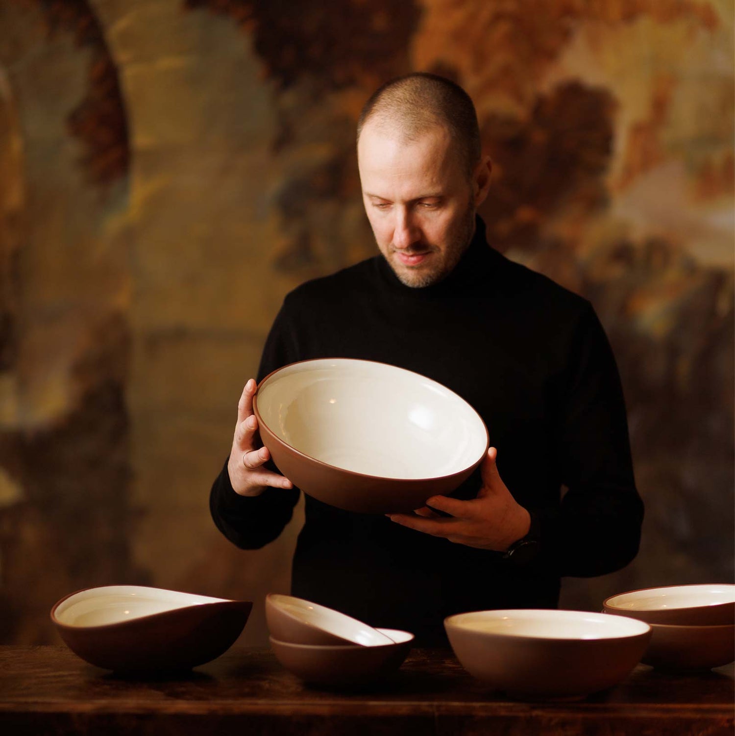 Miks Balodis holding Earth Raw collection bowl